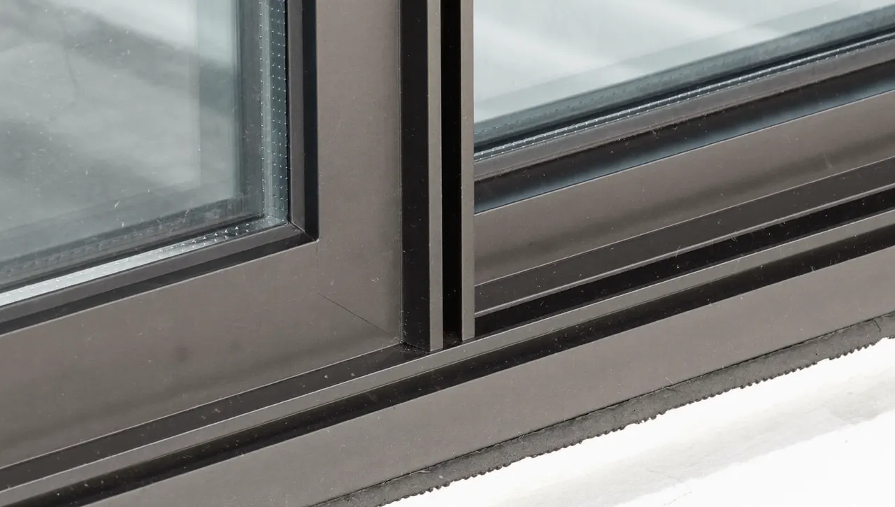 Corner detail of a slim aluminium window frame