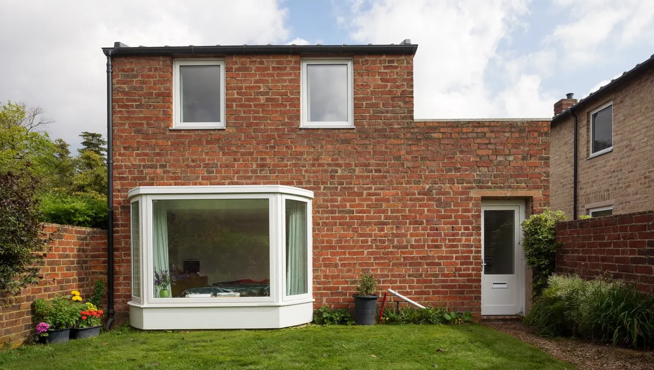 Bay window on a brick semi-detached house